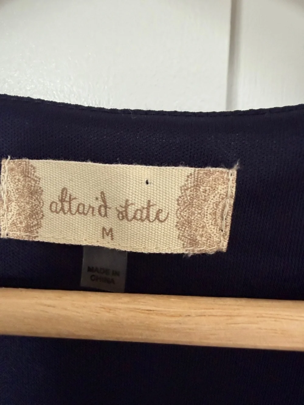 Altar'd State Navy Swiss Dot Surplice Mini Dress